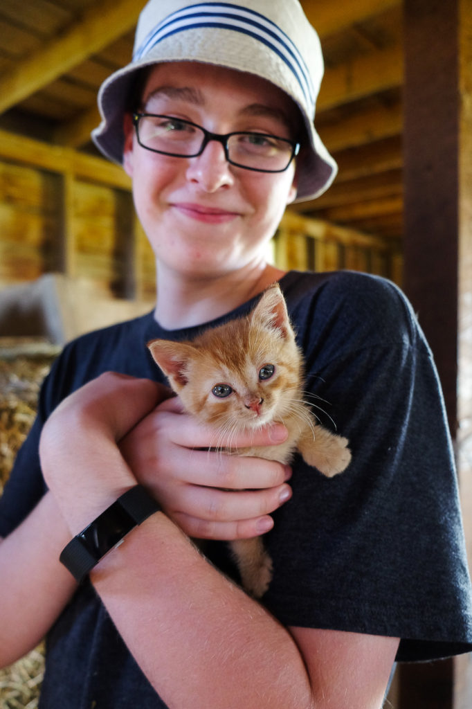 Ari holding a kitten
