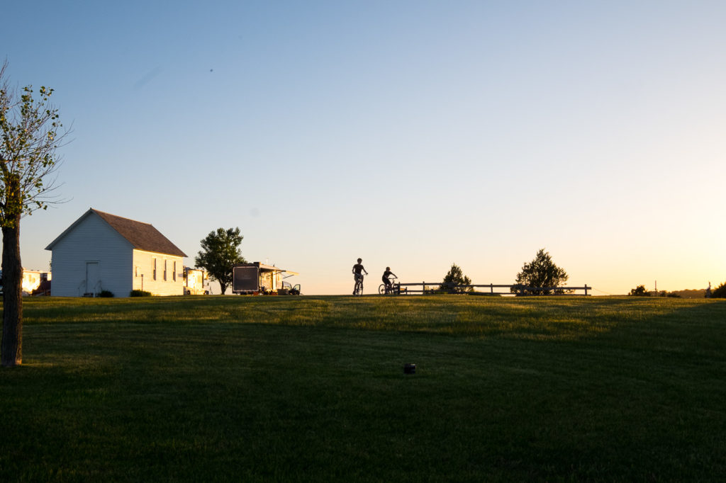 riding bikes at sunset at the Ingalls Homestead