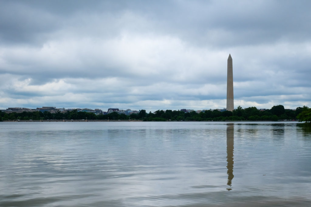 Washington Monument with cloudy skies