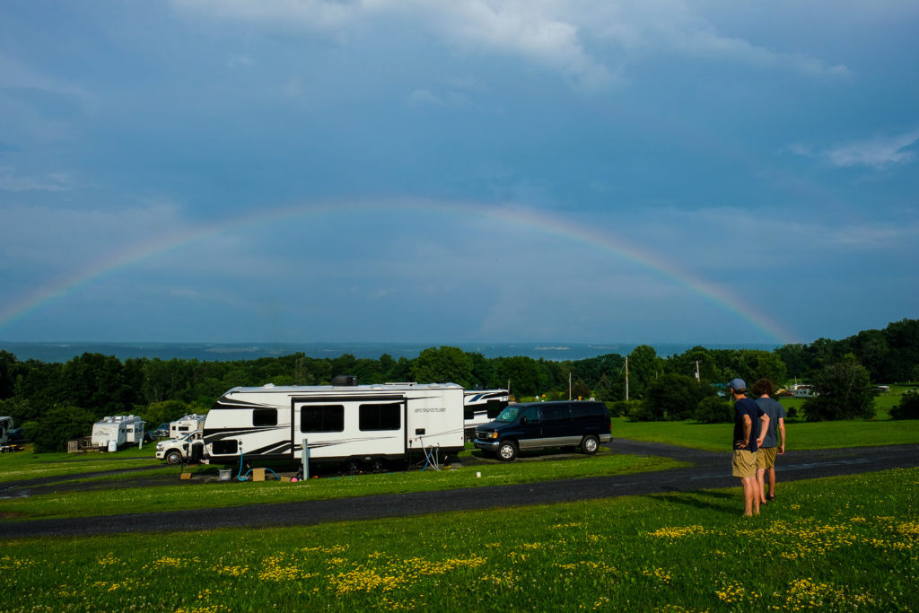rainbow over travel trailer