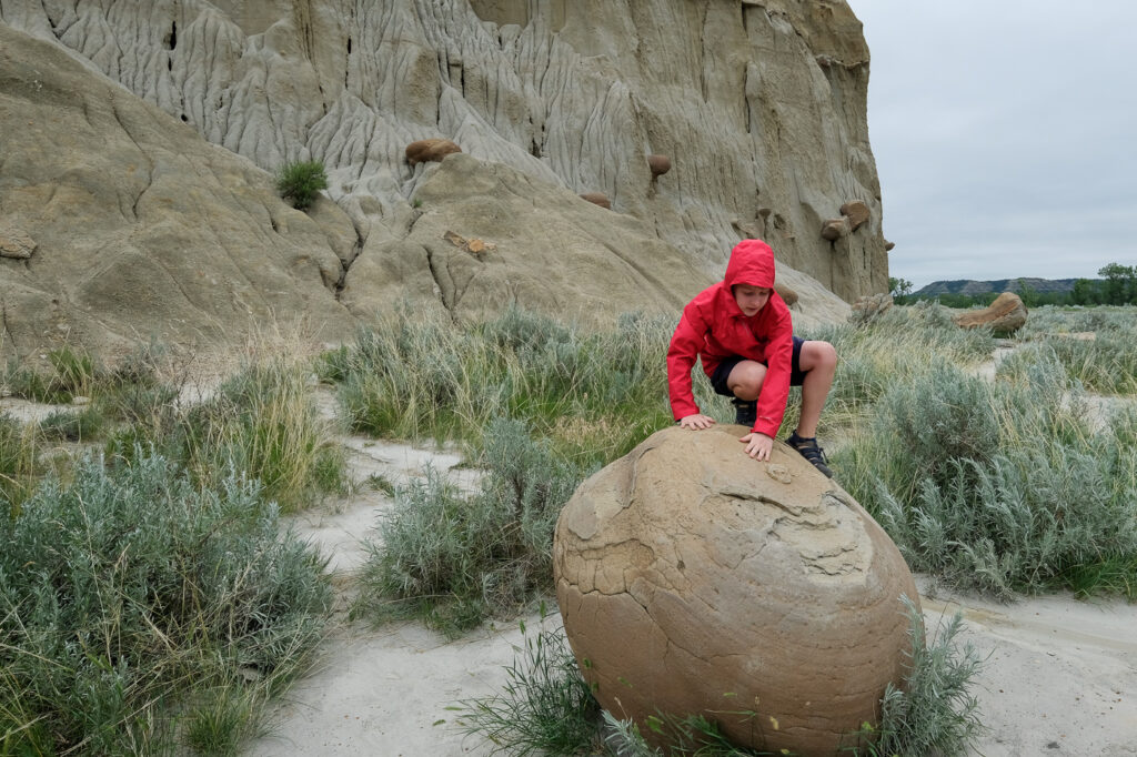 Abe climbing on a cannonball concretion
